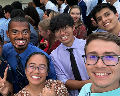 Selfie of diverse group of young men and women