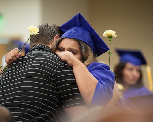 Joyous Gateway College Graduates Embrace