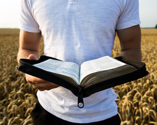 eHuddle article photo young man reading Bible