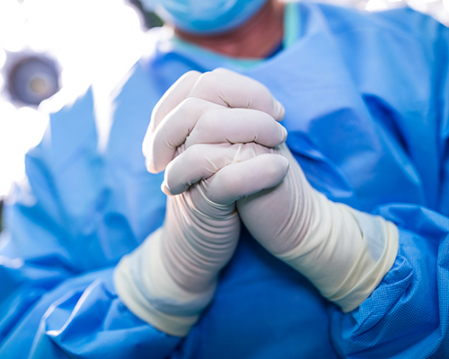 Doctor praying before surgery