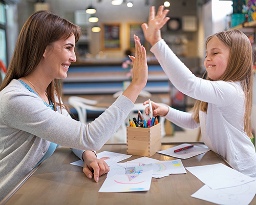 Blackmer commentary female teacher and girl high five