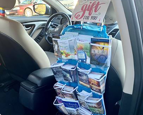 mobile tract rack in Uber car