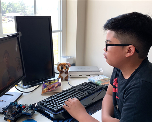 Boy watching The Tent evangelistic series