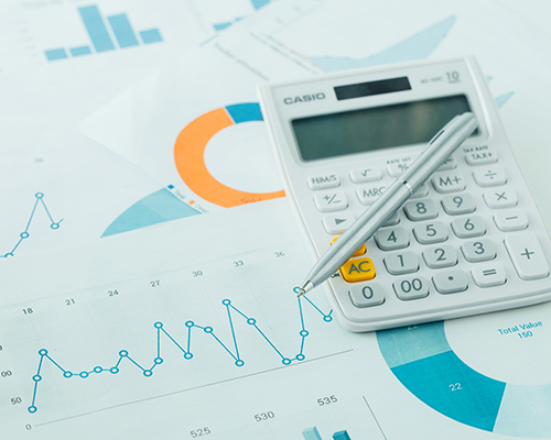 calculator and pencil stock photo