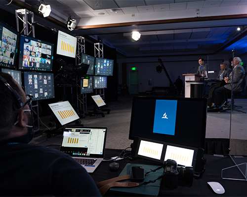 Luis Sanchez, senior office assistant for the NAD Ministerial Association, monitors slides presented by Kyoshin Ahn, NAD executive secretary, on membership accession rates. 