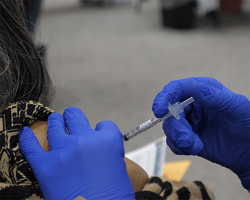 patient getting vaccination at NAD