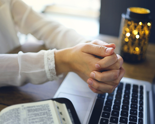 stock photo of online church worshipper