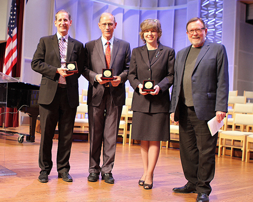 Weniger Society awardees included three current and former La Sierra University faculty -- left to right, Lyndon Johnston Taylor, Gilbert Valentine and Kendra Haloviak Valentine. Joining them is Weniger Society executive committee member and La Sierra University President Emeritus Larry Geraty.