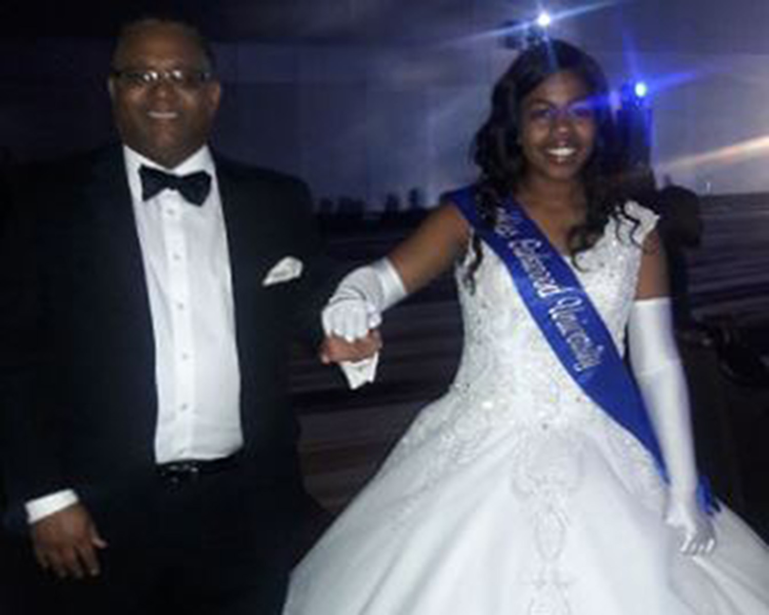 A man and a woman in formal attire