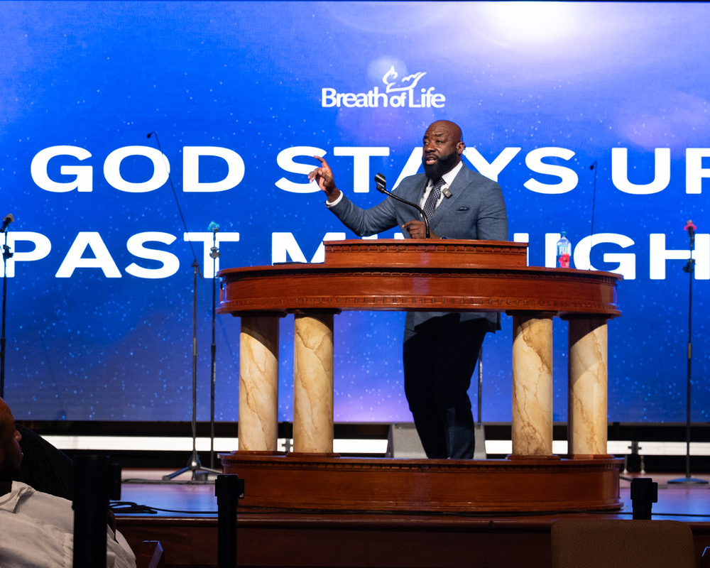 Man preaches at breath of life revival in St. Louis.