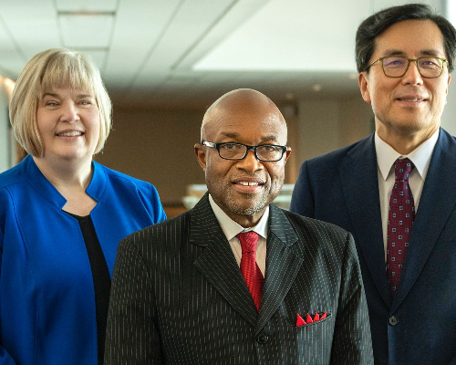 Three NAD leaders pose for a photo