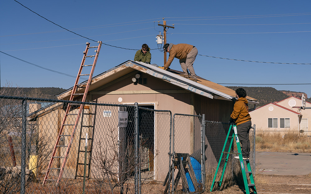Over in Fort Defiance at the Rez Refuge Youth Center, the team re-roofed a storage shed and replaced flooring in several rooms, including the music room and offices.