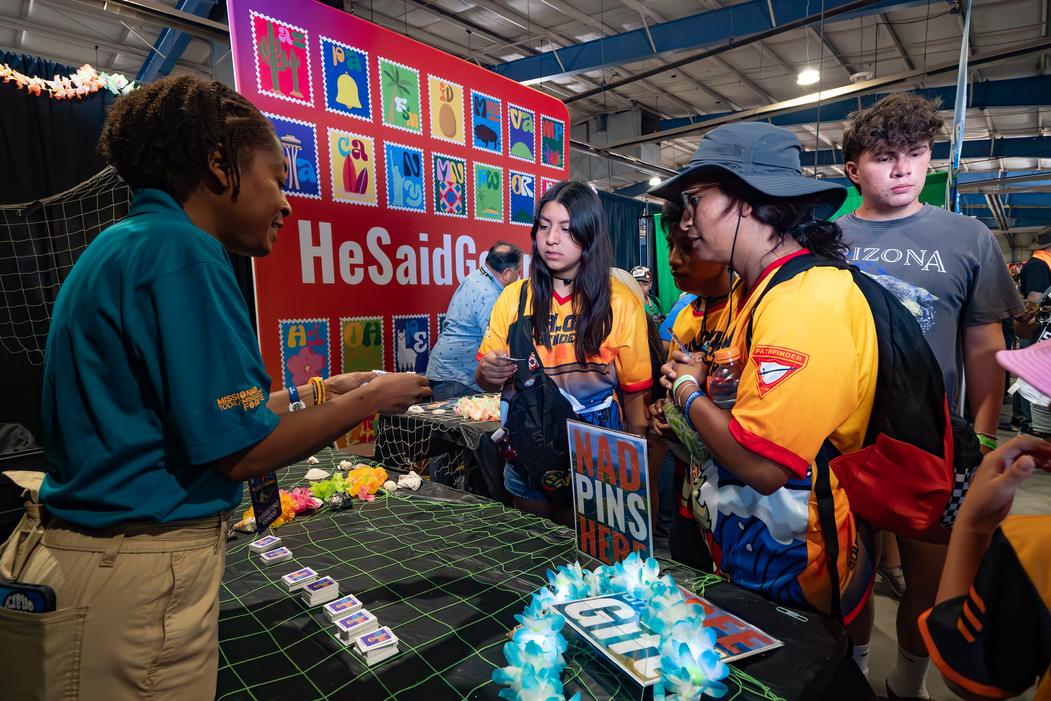 Gladys Guerrero, tutoring and mentorship coordinator for the NAD Office of Volunteer Mission, interacts with Pathfinders during the “Believe the Promise” International Pathfinder Camporee. Photo: Art Brondo | North American Division