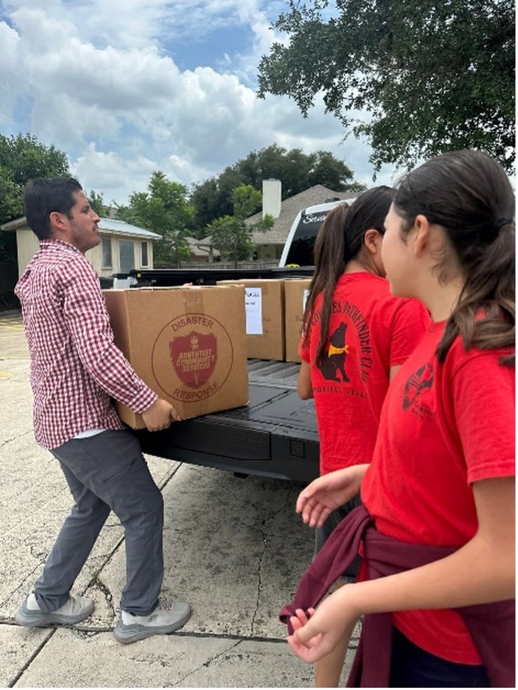 Box of supplies loaded onto pickup to help flood victims in Kerrville Texas