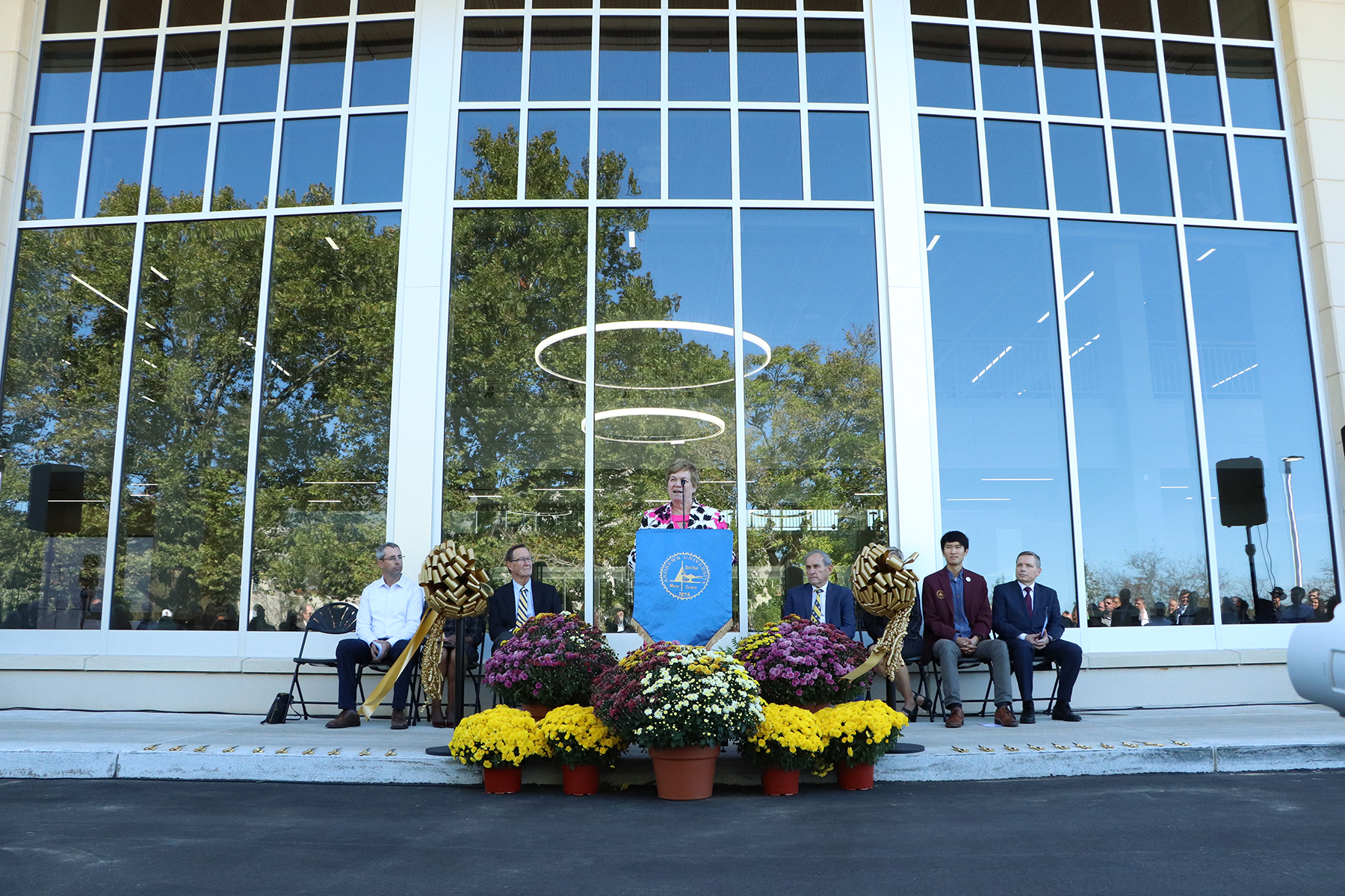 Andrea Luxton speaks to gathered crowd
