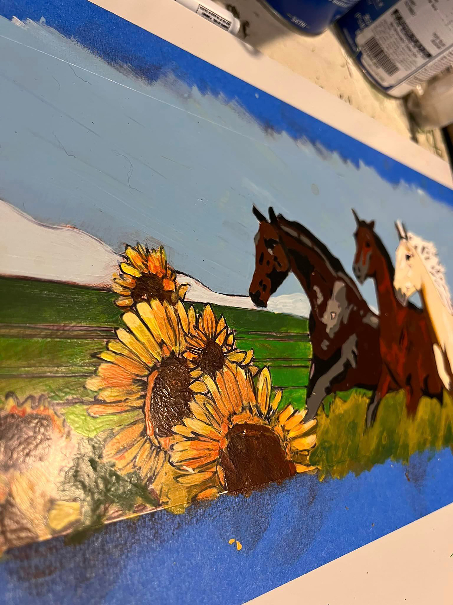 picture of painting with flowers and horses