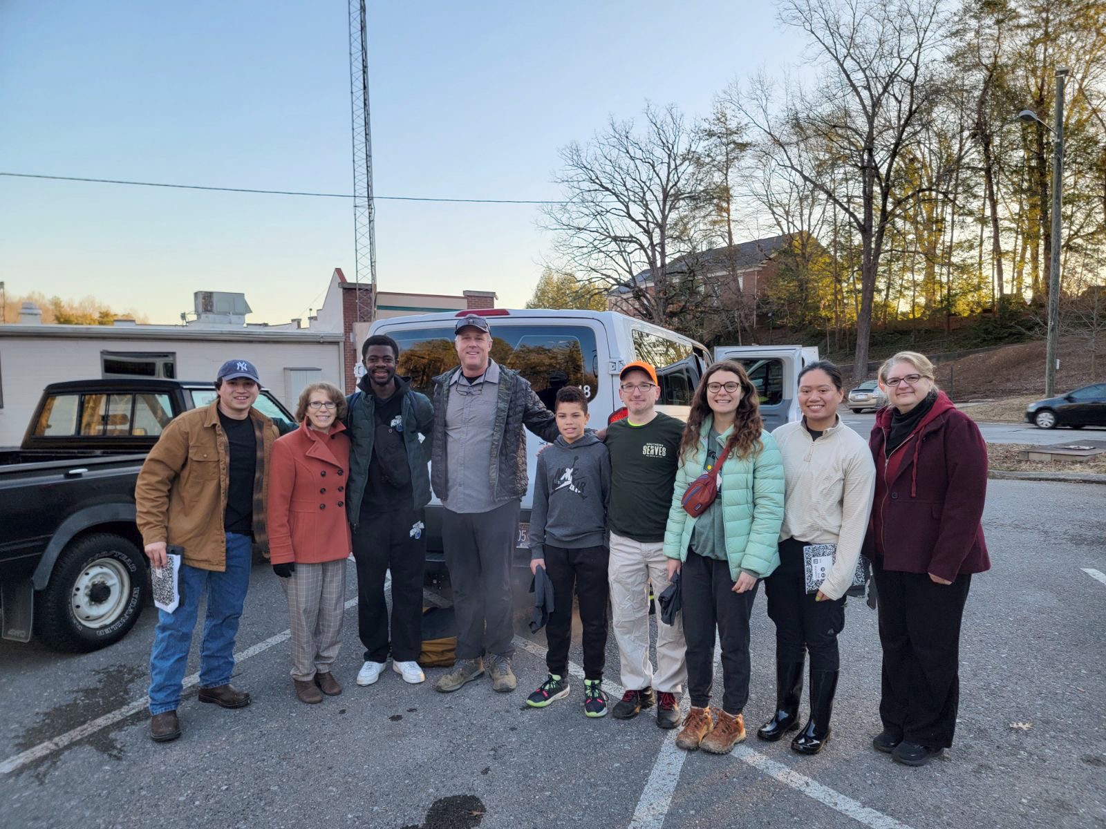 A group of students and sponsors are ready to leave Southern Adventist University's campus for their week of outreach.