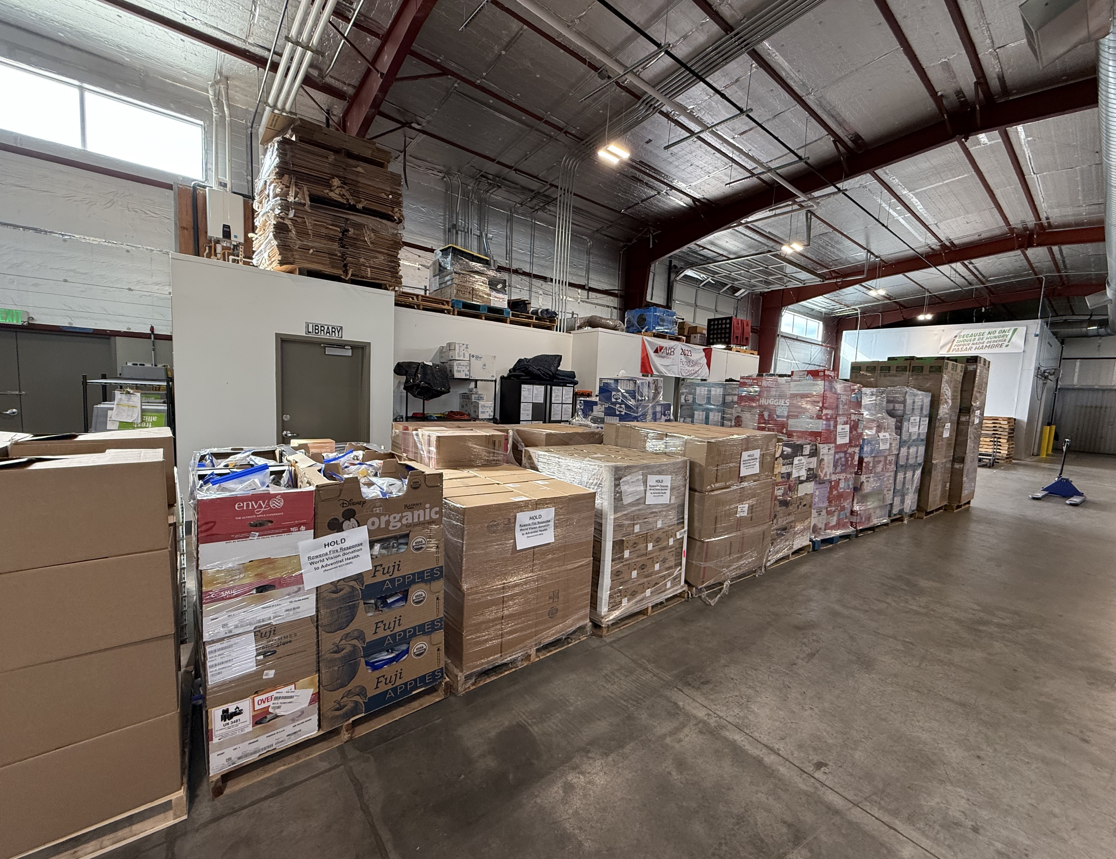 Donation pallets lined up at distribution center.