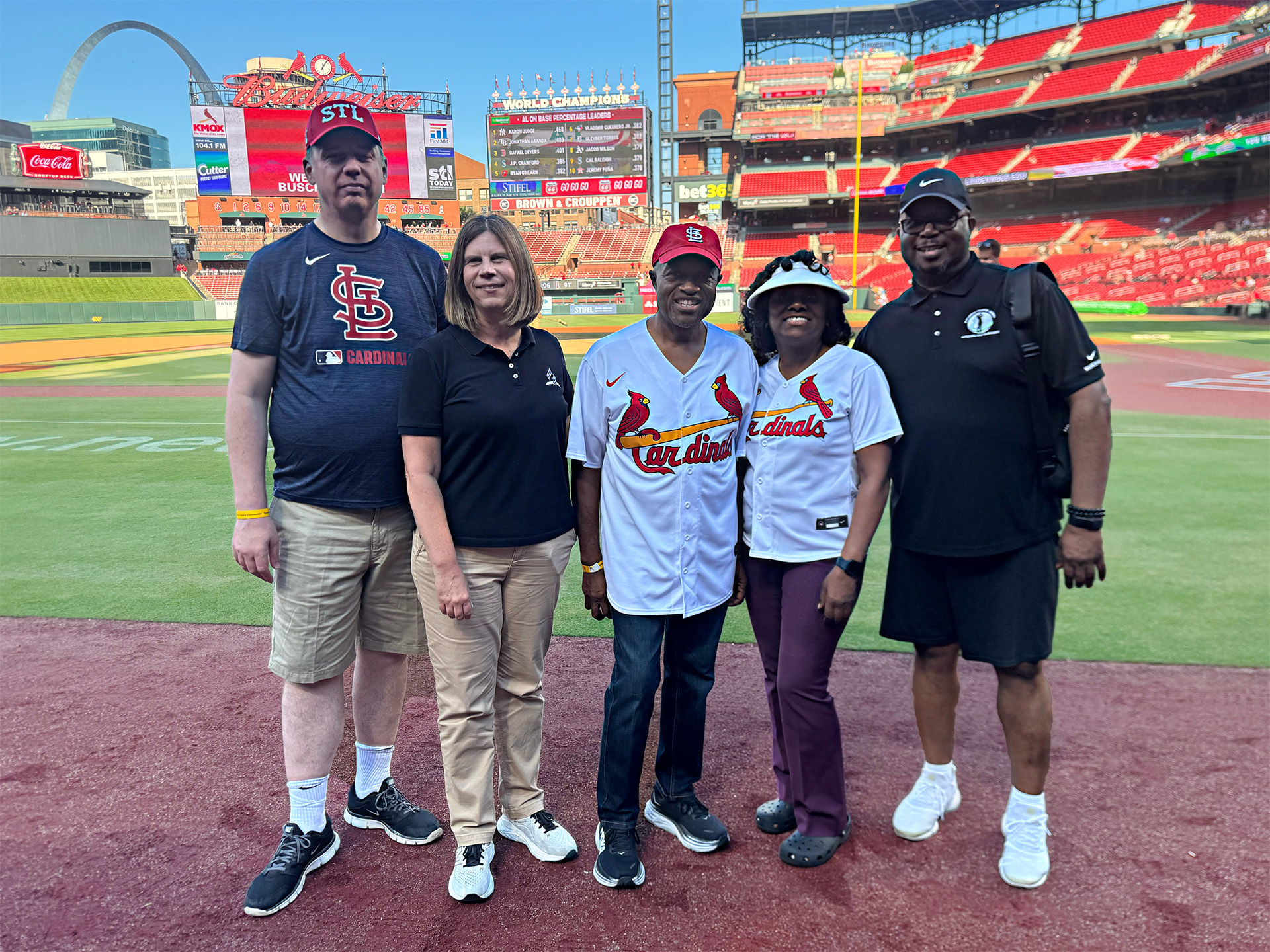group on field at St. Louis Cardinals game July 10, 2025