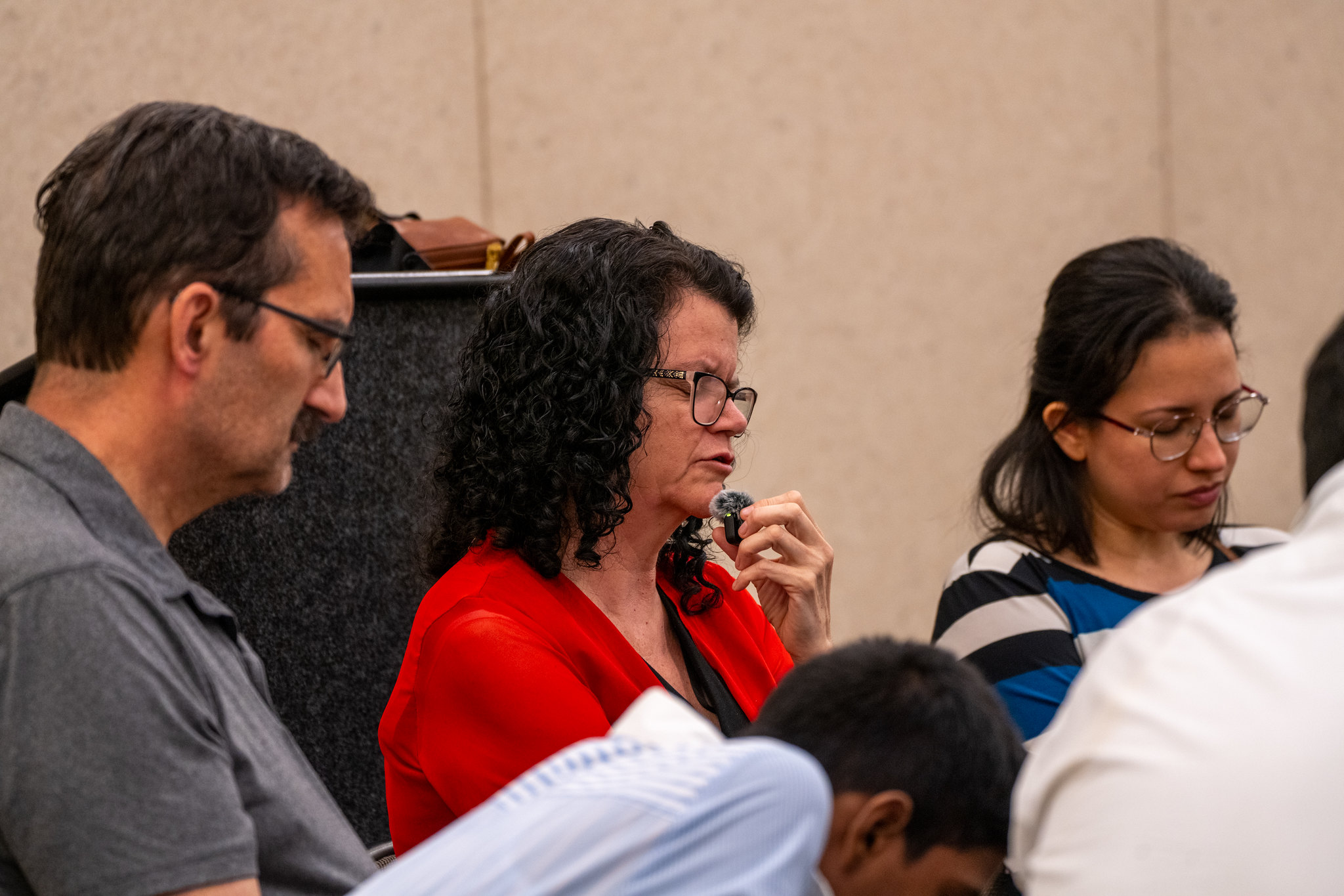 Karen Glassford, director of GC's Digital Strategy for Mission, leads a round of prayer.