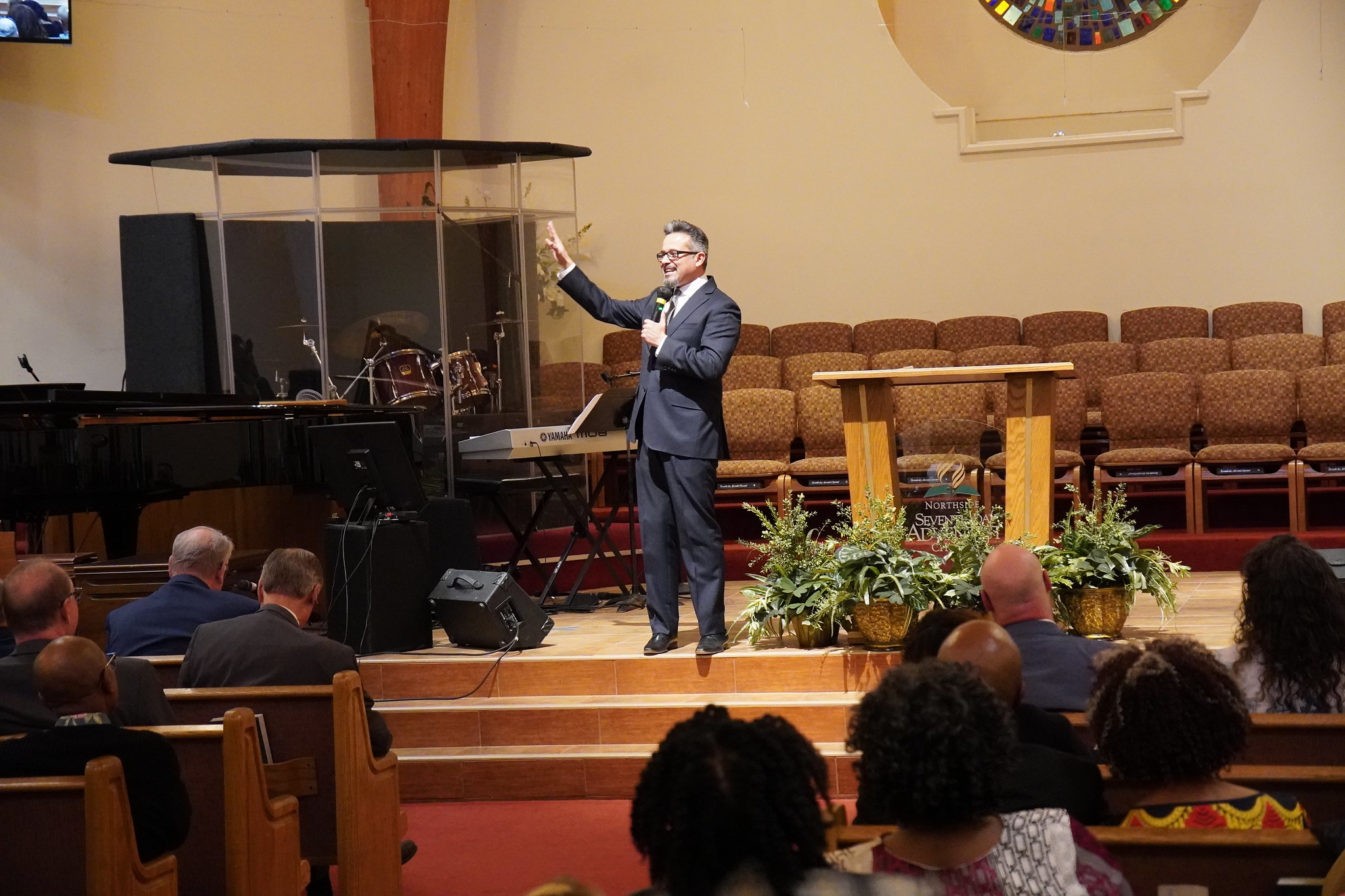 Elden Ramirez, middle age Latino man, speaks in a church setting