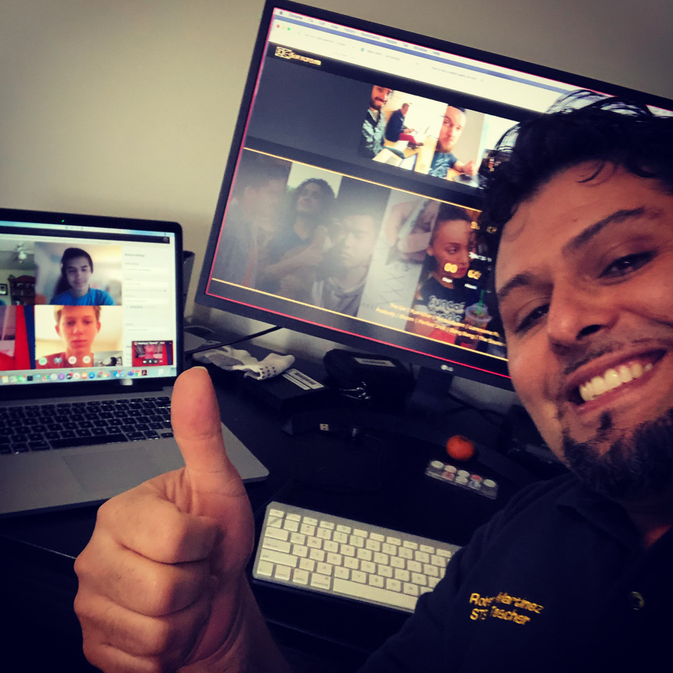 High school film teacher Robert Martinez watches a Sonscreen film block with his students from Spencerville Adventist Academy. Photo provided by Robert Martinez