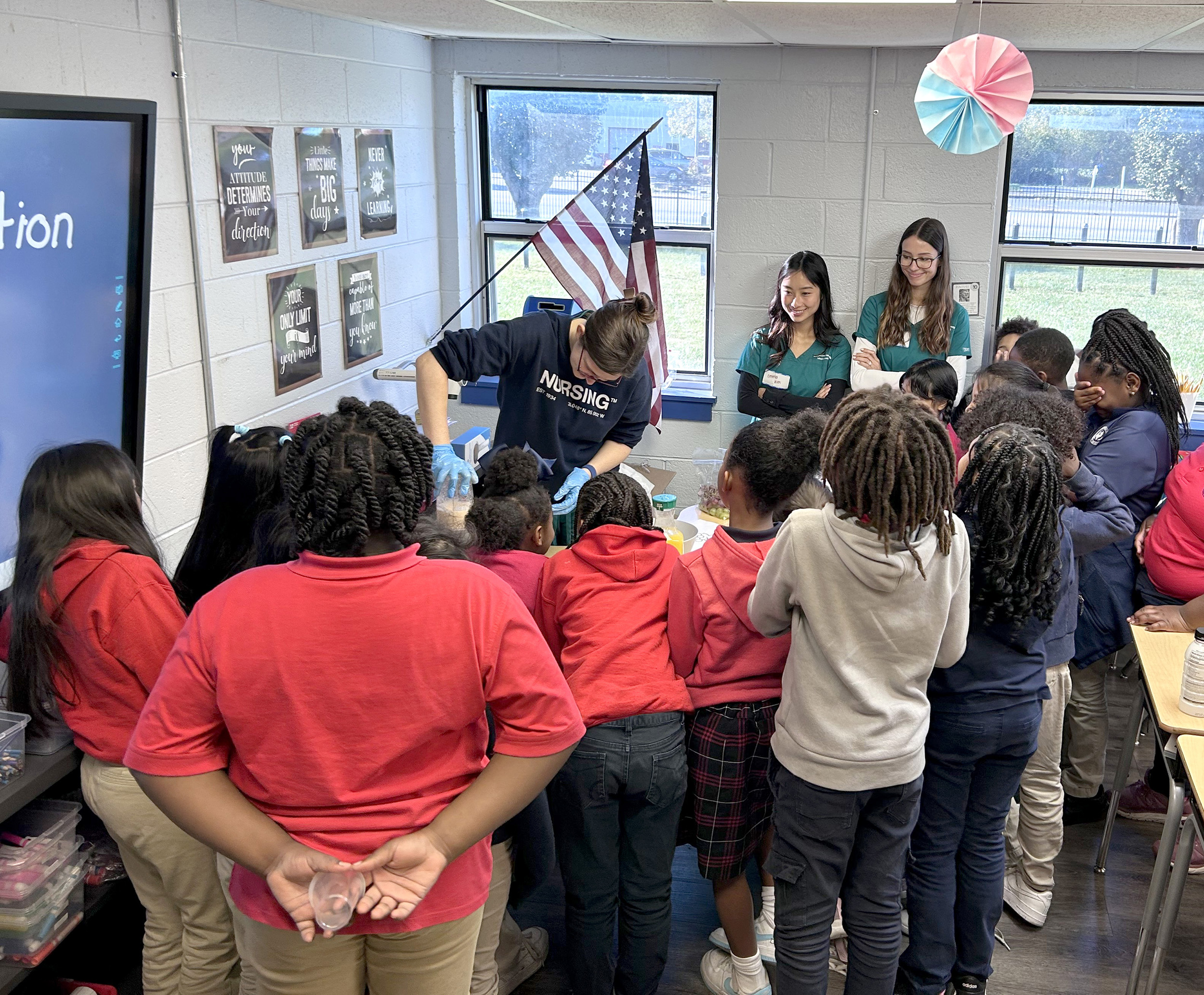 SAU students lead out in a health workshop with 3rd grade students.