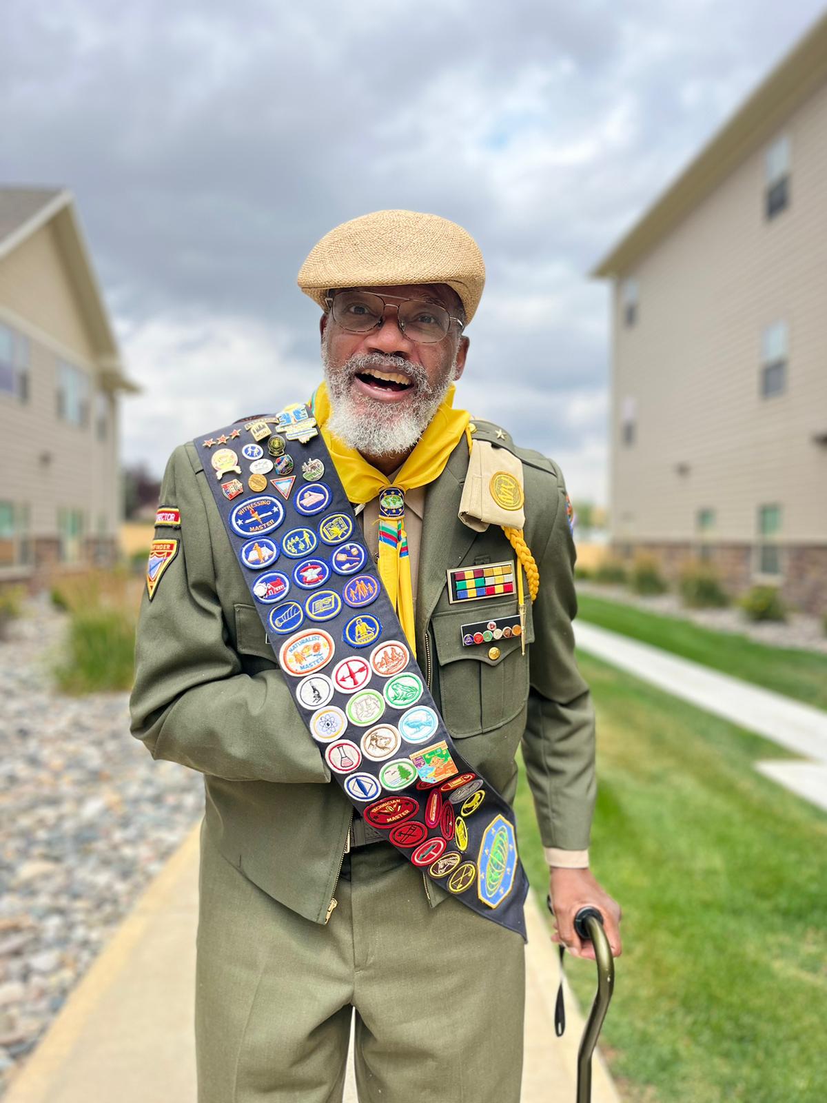 (Photo of Vernon showing his sash. Photo credit: Vernée Norman Photography) Vernon all dressed up and ready to head to the Cam-Plex, site of the Camporee. (Photo of Vernon with Shannon, his Wish Manager)